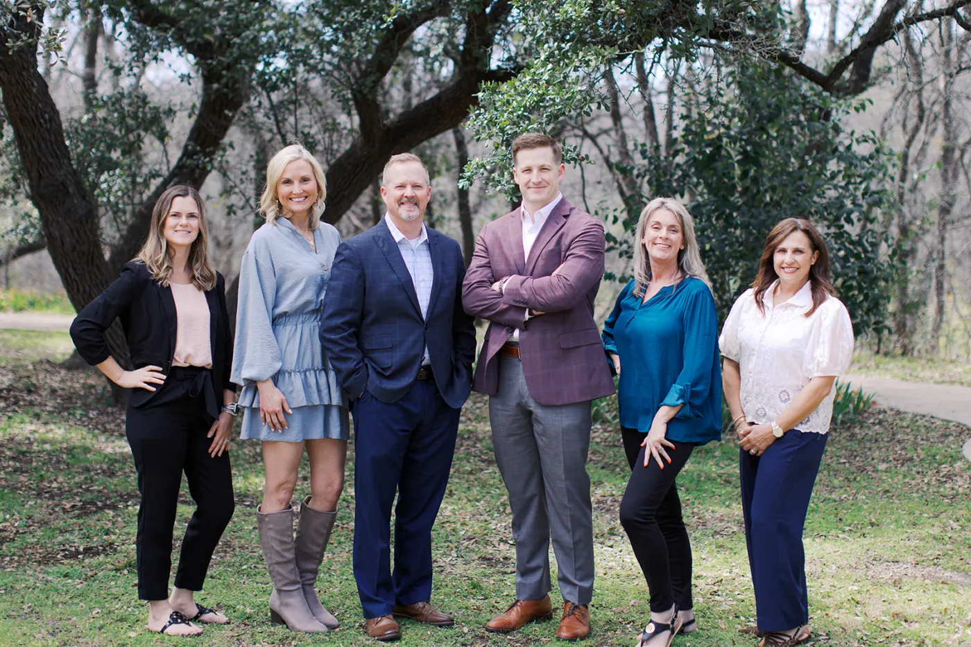 The Gough Wealth Management team poses not far from their offices in Aledo, TX